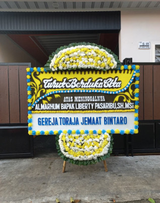 Papan Bunga Duka di Pule